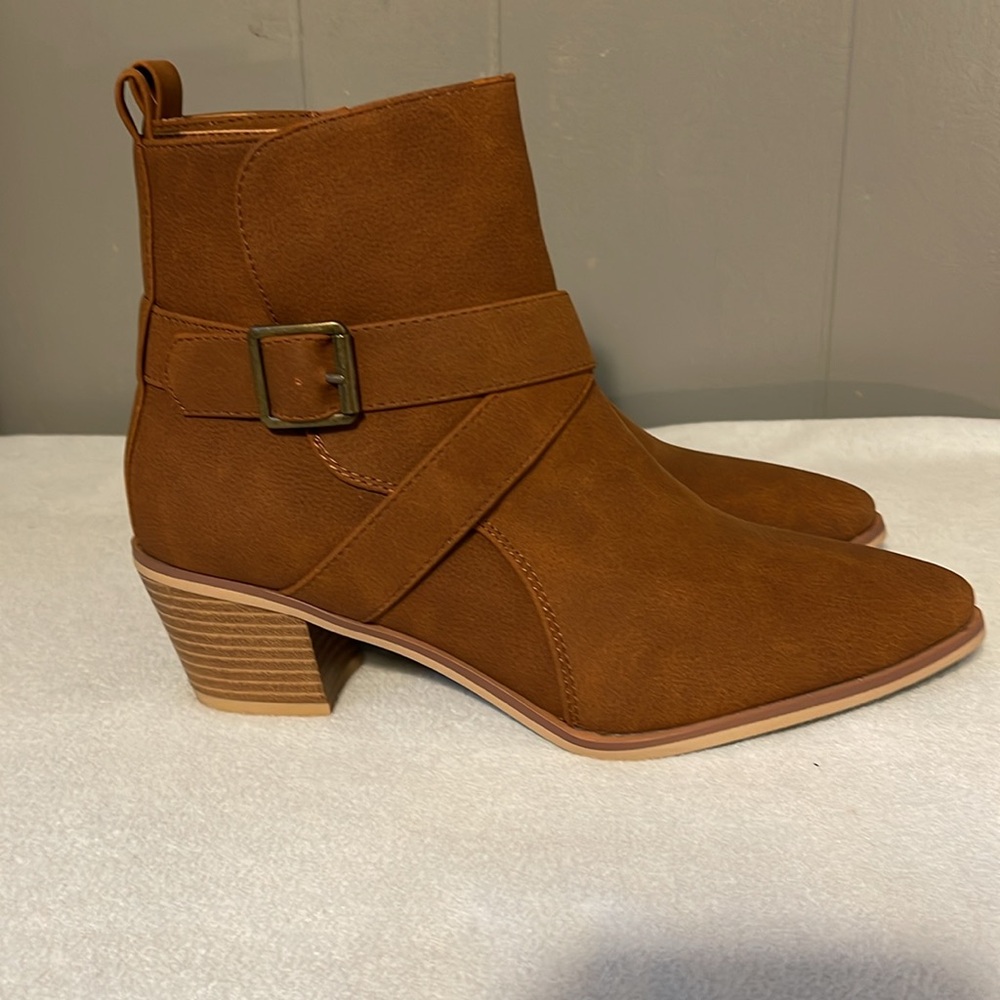 NWOT Maurices brown boots. Never worn. Size 7.5